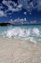 Wave crashing on beach