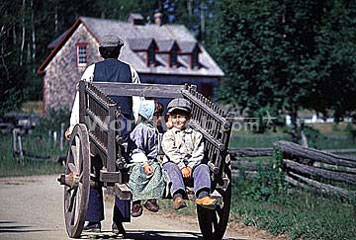 Kids Get a Wagon Ride at The Village Historique Acadien