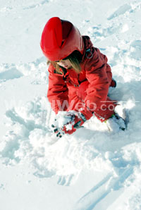 Girl Playing in Snow