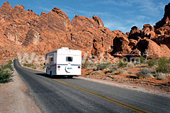 An RV Driving through the Red Rocks near Las Vegas