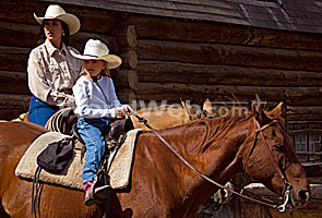 Woman and Young Girl Ready to Ride, USA Guest Ranch