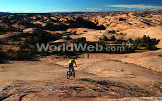 A Cyclist on Slickrock Trail