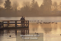 Click here to send this image of people fishing at Mill Lake in Abbotsford, British Columbia as a free electronic postcard 